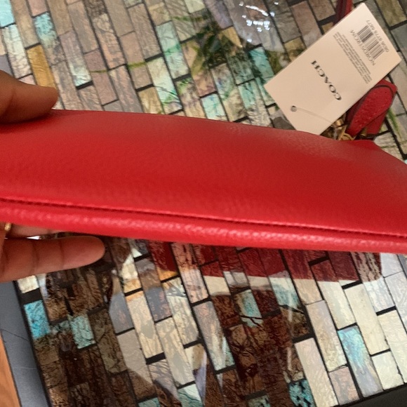 Coach Leather Wristlet
COACH - Picture 15 of 17